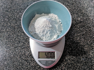 flour in a bowl on a scale