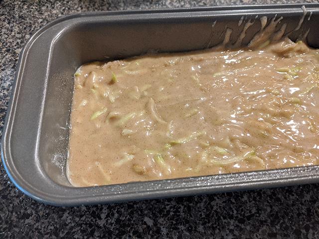 zucchini walnut batter in bread pan