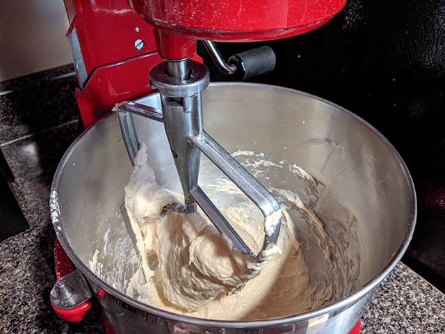 english muffin bread dough mixed together in kitchenaid
