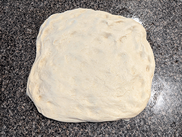 super soft sourdough sandwich bread dough in rectangle
