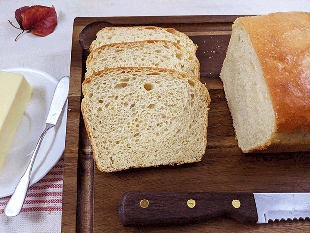 super soft satin smooth sourdough sandwich bread on cutting board