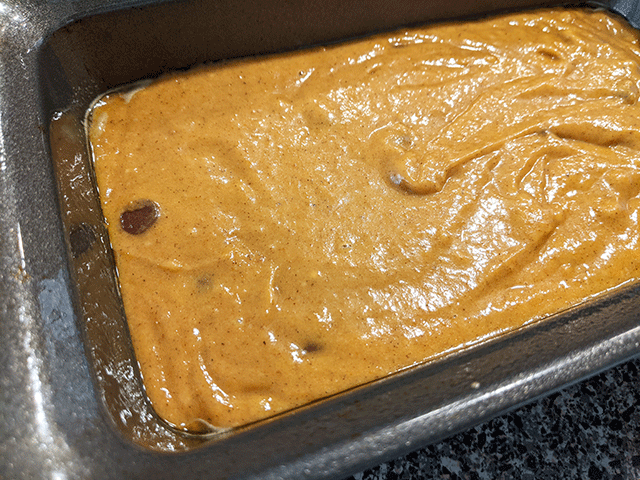 pumpkin chocolate chip walnut bread batter in pan