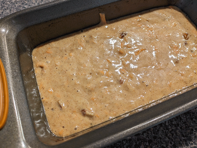 sourdough discard carrot cake bread batter in pan