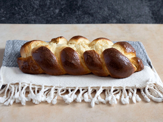 braided egg bread challah with split